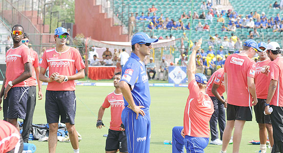 Rajasthan Royals' players at a training session as captain Rahul Dravid looks on