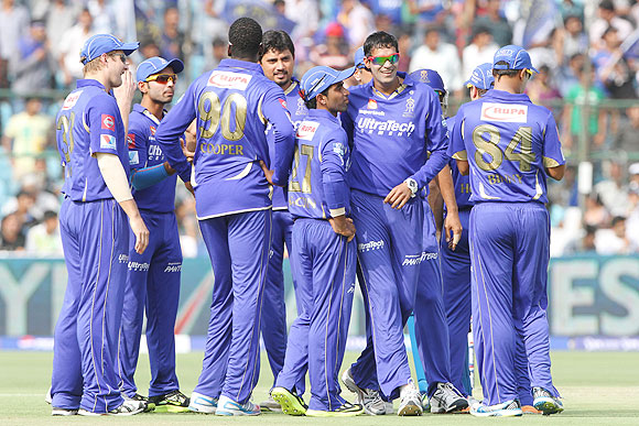 Off-spinner Ajit Chandila (second from right) celebrates a wicket with teammates