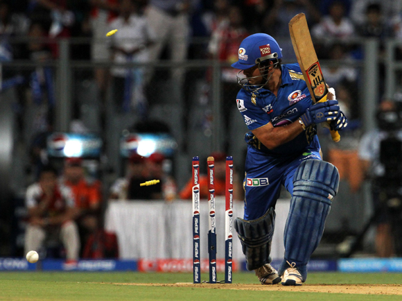 Mumbai Indian player Sachin Tendulkar gets bowled