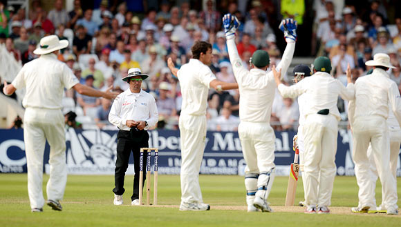 Australia's players appeal to umpire Aleem Dar for the wicket of Stuart Broad