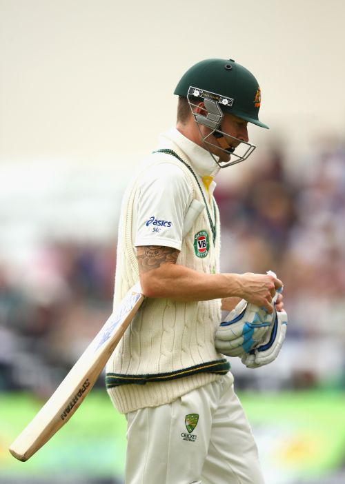 Michael Clarke of Australia looks dejected after being dismissed by Stuart Broad