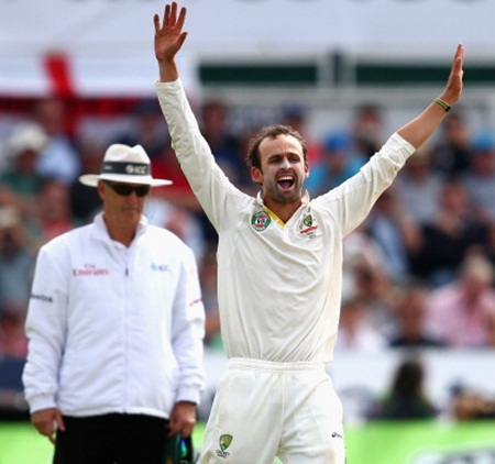 Nathan Lyon celebrates after taking the wicket of Kevin Pietersen 