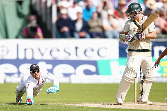  Matt Prior lunges to take a catch to dismiss Chris Rogers of Australia, off the bowling of Graeme Swann, on Day 3 of 4th Ashes Test in Chester-le-Street on Sunday