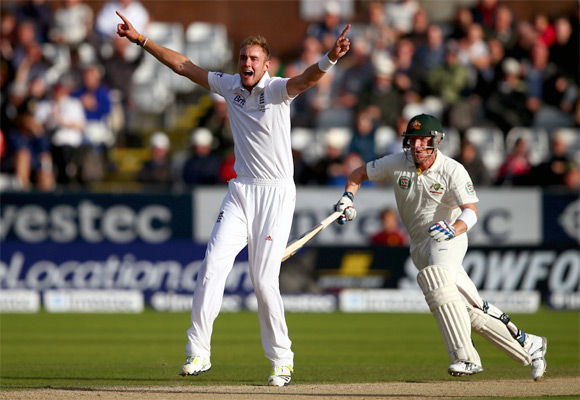 Stuart Broad of England celebrates after claiming the wicket of Brad Haddin of Australia