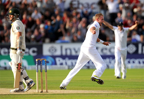 England bowler Stuart Broad celebrates after dismissing Ryan Harris