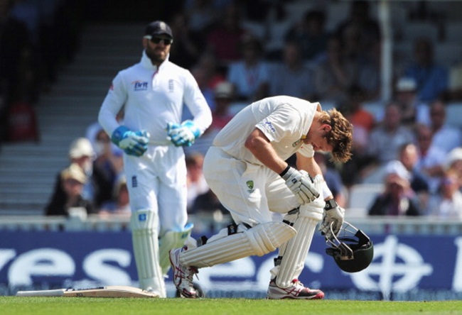 Shane Watson grimaces after being hit by a delivery from Stuart Broad