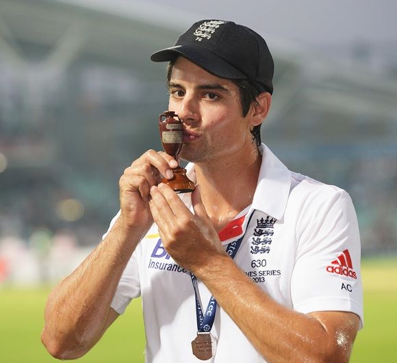 Alastair Cook of England kisses the urn after winning the Ashes in August 2013