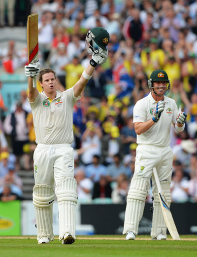 Steve Smith of Australia celebrates his century watched by Brad Haddin during Day Two of the fifth Ashes Test at The Oval