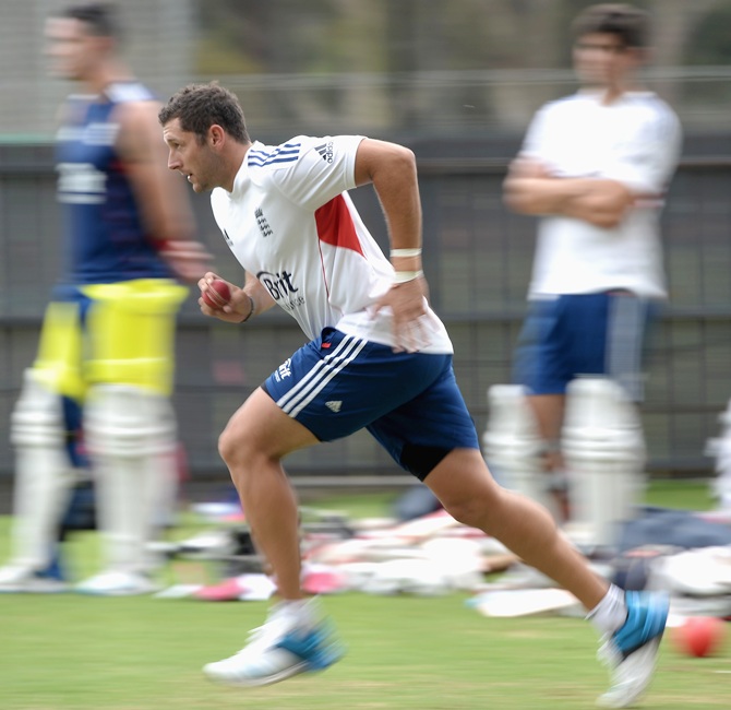 Tim Bresnan of England runs into bowl during a nets session