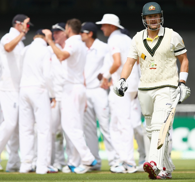 Shane Watson of Australia walks from the ground after he was dismissed by James Anderson