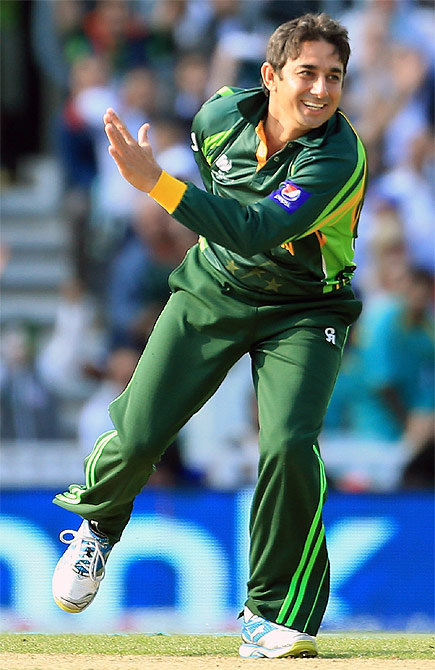 Saeed Ajmal of Pakistan celebrates taking a wicket