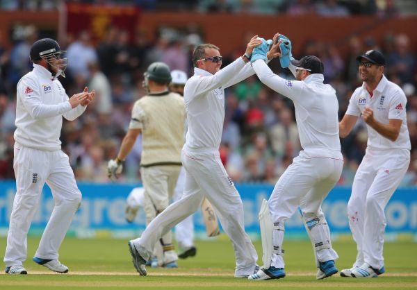 Graeme Swann celebrates after getting a wicket
