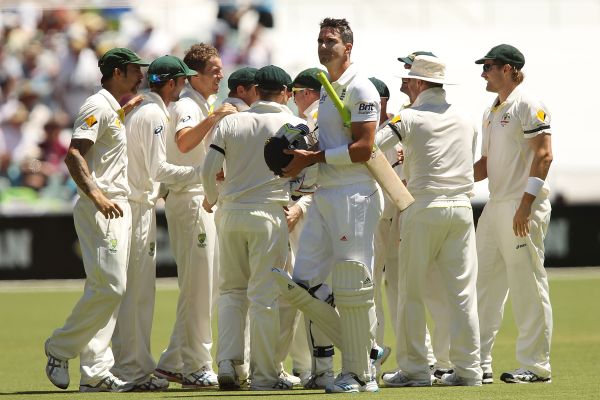 Kevin Pietersen of England leaves the field after getting out as Australian players celebrate