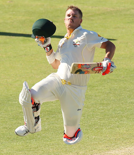 David Warner of Australia celebrates reaching his century