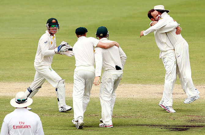 Nathan Lyon of Australia celebrates the wicket of Graeme Swann of England on Day 5 of the Third Ashes Test at WACA in Perth on Tuesday
