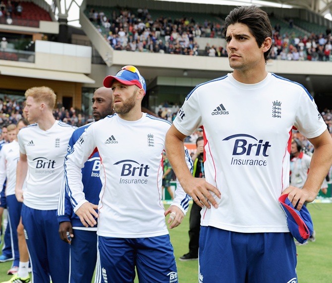 England captain Alastair Cook lines up with his team after losing