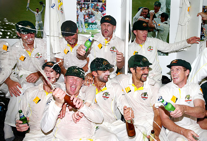 The Australian team celebrates victory in the change rooms after winning the Third Ashes Test Match and the Ashes at WACA in Perth on Tuesday