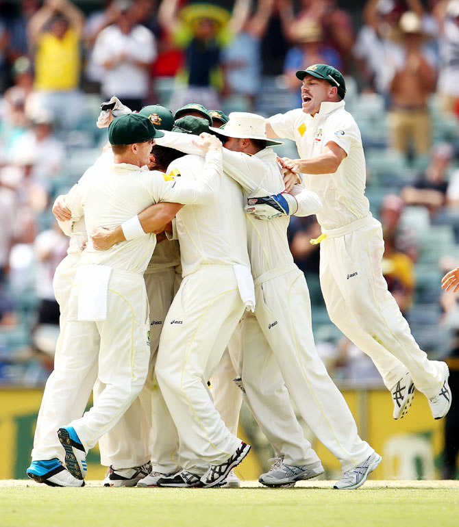David Warner of Australia and the Australian team celebrate victory on Day 5 of the Third Ashes Test at WACA in Perth on Tuesday