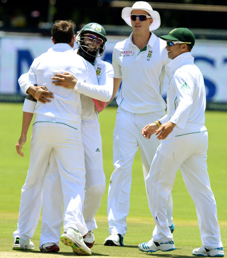 Dale Steyn of South Africa celebrates the first wicket