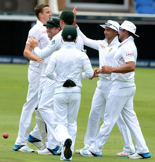 Morne Morkel of South Africa celebrates the wicket of MS Dhoni