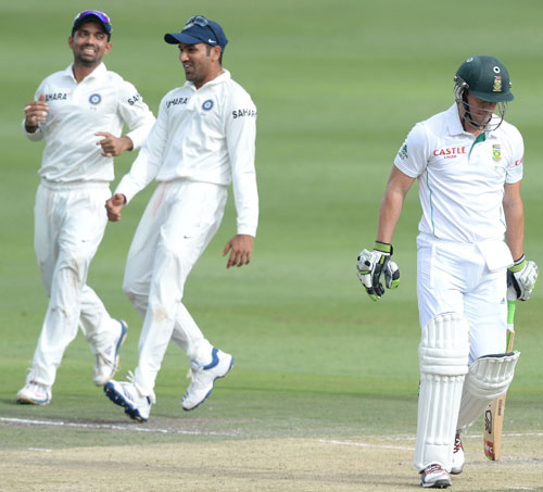 Ajinkya Rahane and Rohit Sharma celebrate AB de Villiers' dismissal