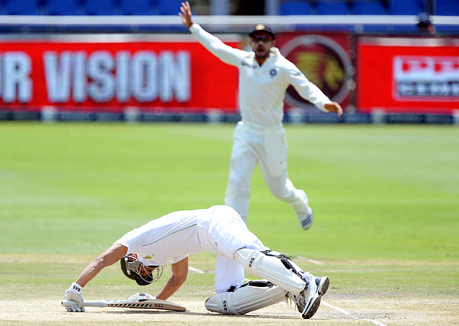 Alviro Petersen of South Africa gets floored by a Mohammad Shami yorker on Sunday