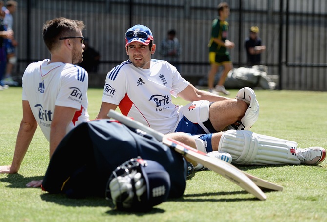 England captain Alastair Cook speaks with James Anderson during an England nets session at Melbourne Cricket Ground
