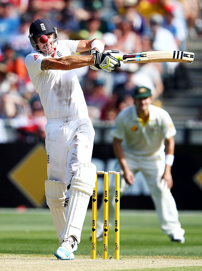 Kevin Pietersen of England is struck by a delivery from Peter Siddle of Australia on Day 1 of the fourth Test at the MCG on Thursday