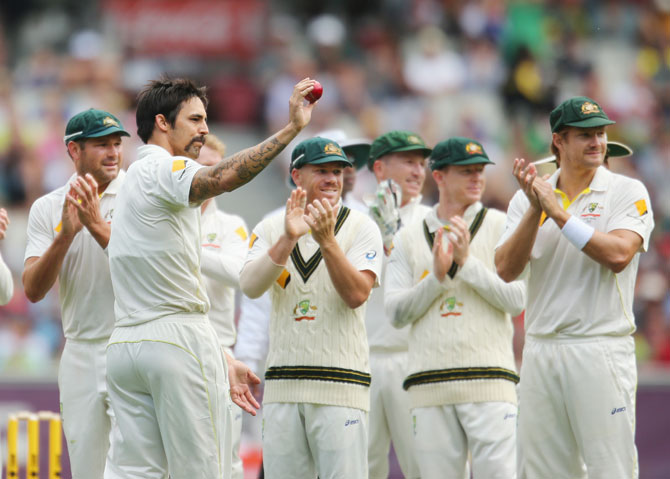 Mitchell Johnson acknowledges the crowd after taking five wickets during day two of the fourth Ashes Test