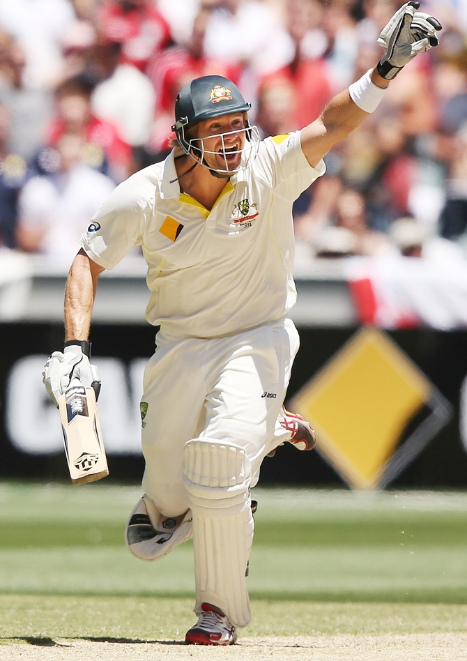 Shane Watson of Australia celebrates hitting the winning runs