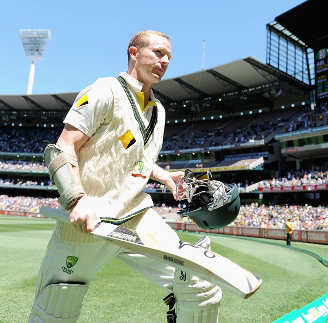 Chris Rogers of Australia leaves the field after making 116 runs