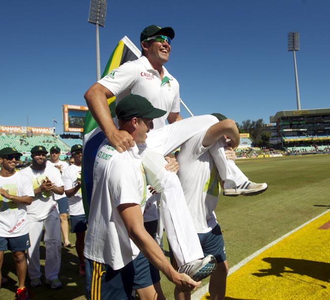 South Africa's Jacques Kallis is carried by his team mates 