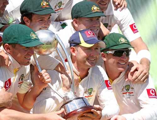 Australian players hold the Border-Gavaskar Trophy