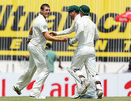 Australia's James Pattinson (left) celebrates the wicket of India's Virender Sehwag on Day 2 of the 1st Test at the MA Chidambaram Stadium in Chennai on Saturday