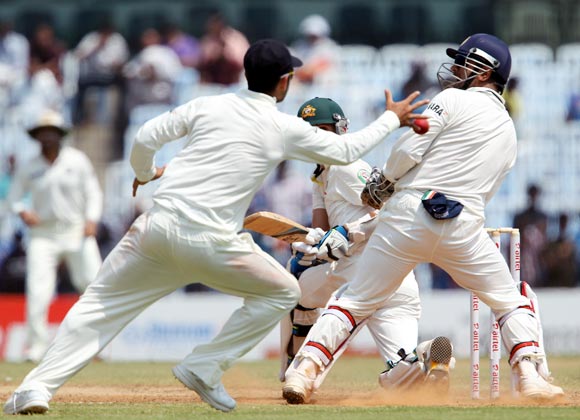 Virat Kohli takes the catch to dismiss Nathan Lyon