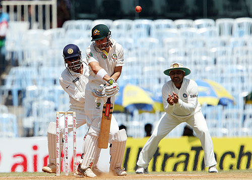 Ed Cowan of Australia deals with an awkward delivery from Harbhajan Singh  on Day 4 of the 1st Test on Monday