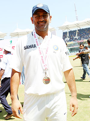 MS Dhoni shows off his Man of the Match medal on Tuesday