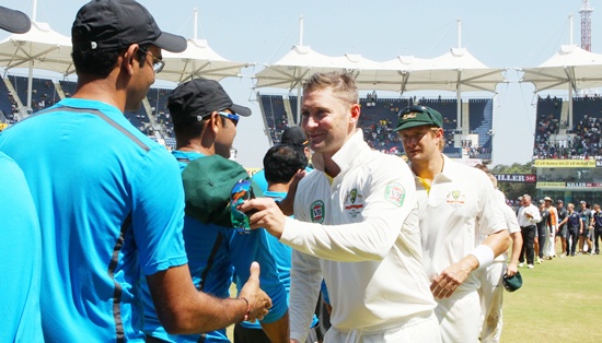 Michael Clarke congratulates the Indian players after the match