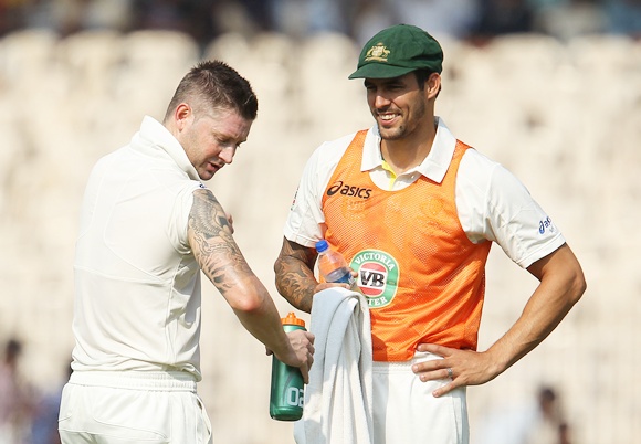 Michael Clarke and Mitchell Johnson chat during a drinks break