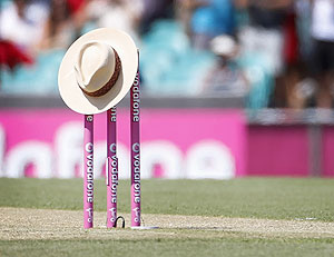 A hat, of the type often worn by Tony Greig, sits atop the stumps before the start of the first day's play of the third Test match between Australia and Sri Lanka