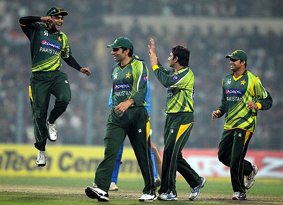 Pakistan players celebrate after winning the match