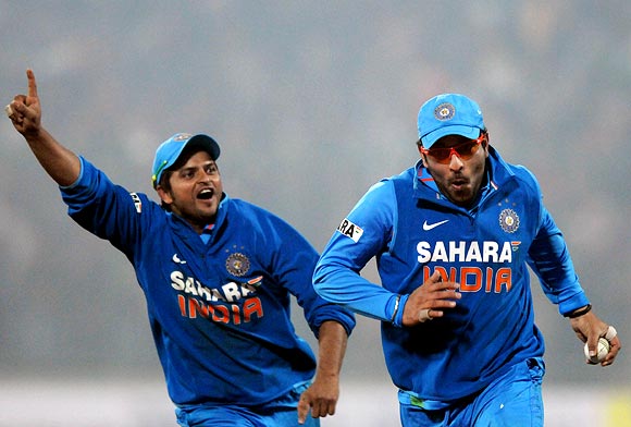 Yuvraj Singh (right) and Suresh Raina celebrate India's victory