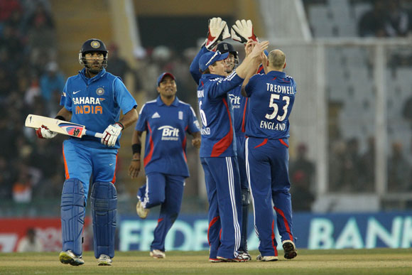James Tredwell of England celebrates the wicket of Yuvraj Singh of India during the 4th ODI in Mohali