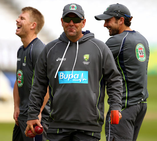 Australia coach Darren Lehmann (centre) with his players during a training session