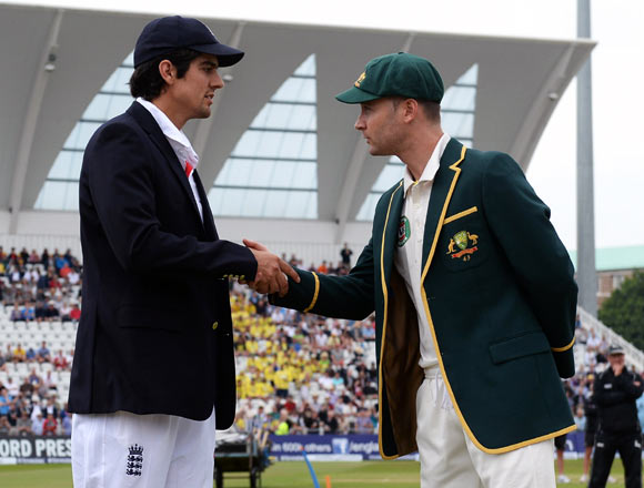 England captain Alastair Cook (left) shakes hands with his Australian counterpart Michael Clarke
