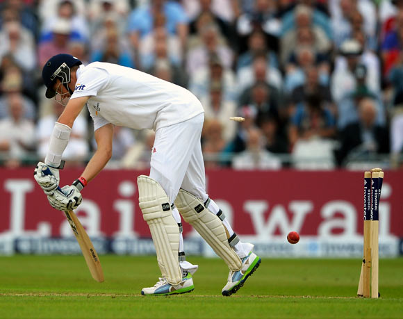 Joe Root is bowled by Peter Siddle
