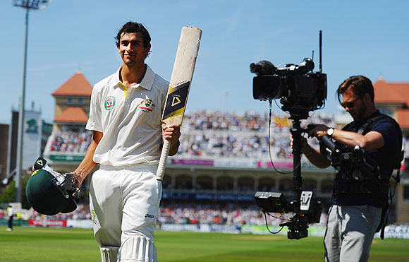 Ashton Agar of Australia acknowledges the crowd after being dismissed by Stuart Broad of England for 98 runs