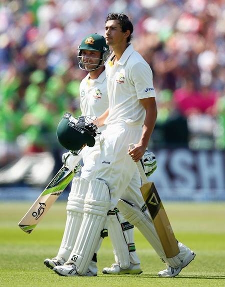 Ashton Agar and Phil Hughes leave the ground after their record 10th wicket partnership