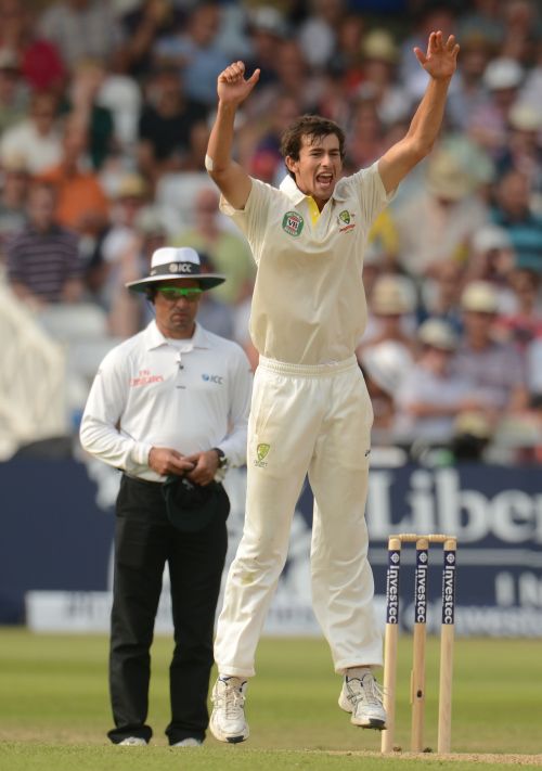 Australia's Ashton Agar celebrates after England's Stuart Broad edged the ball to Michael Clarke but umpire Aleem Dar gave it not out during the first Ashes cricket test match at Trent Bridge cricket ground in Nottingham