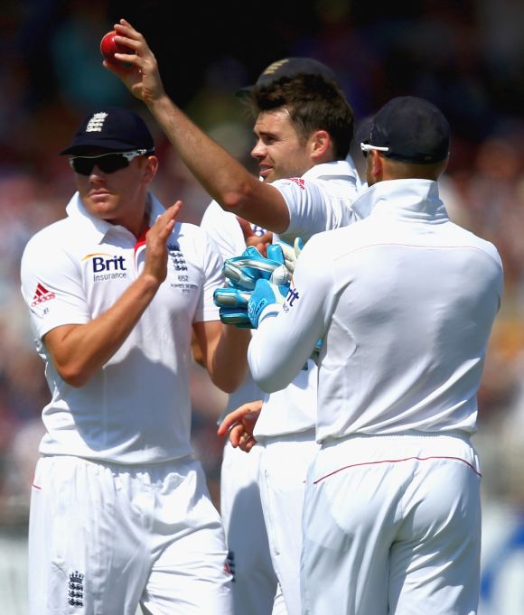 James Anderson of England celebrates taking his fifth wicket 